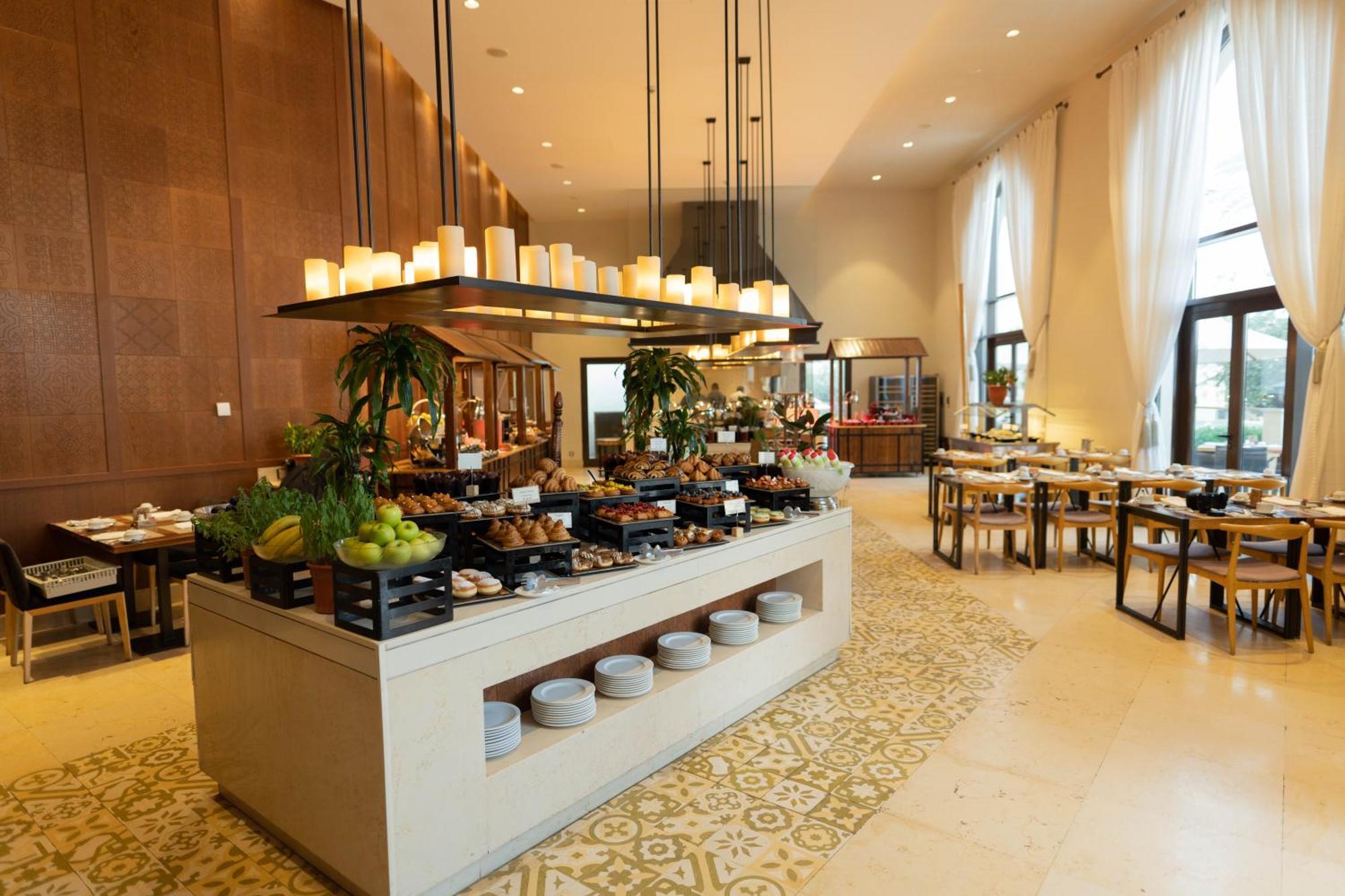 알 마나라, 어 럭셔리 컬렉션 호텔, 사라야 아카바 외부 사진 The restaurant at the hotel